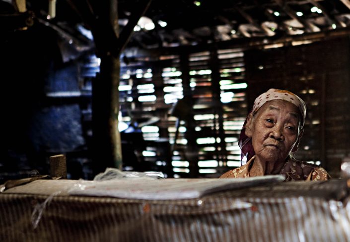 An old Indonesian woman in her home